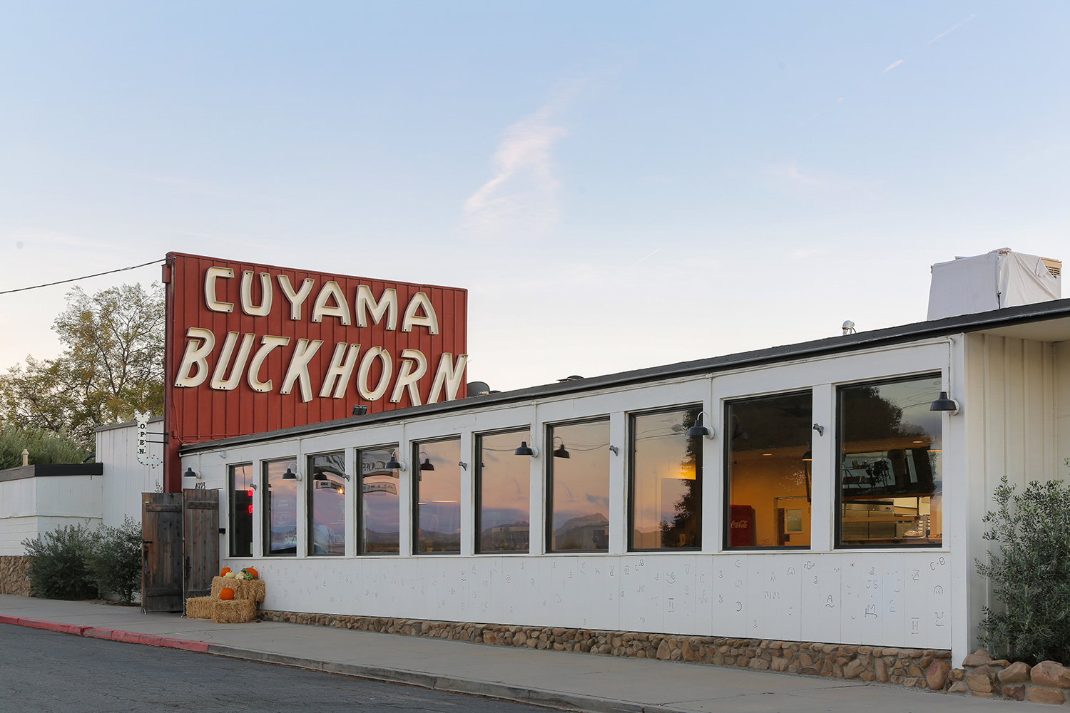 Street view of Cuyama Buckhorn including their large sign in New Cuyama, California.
