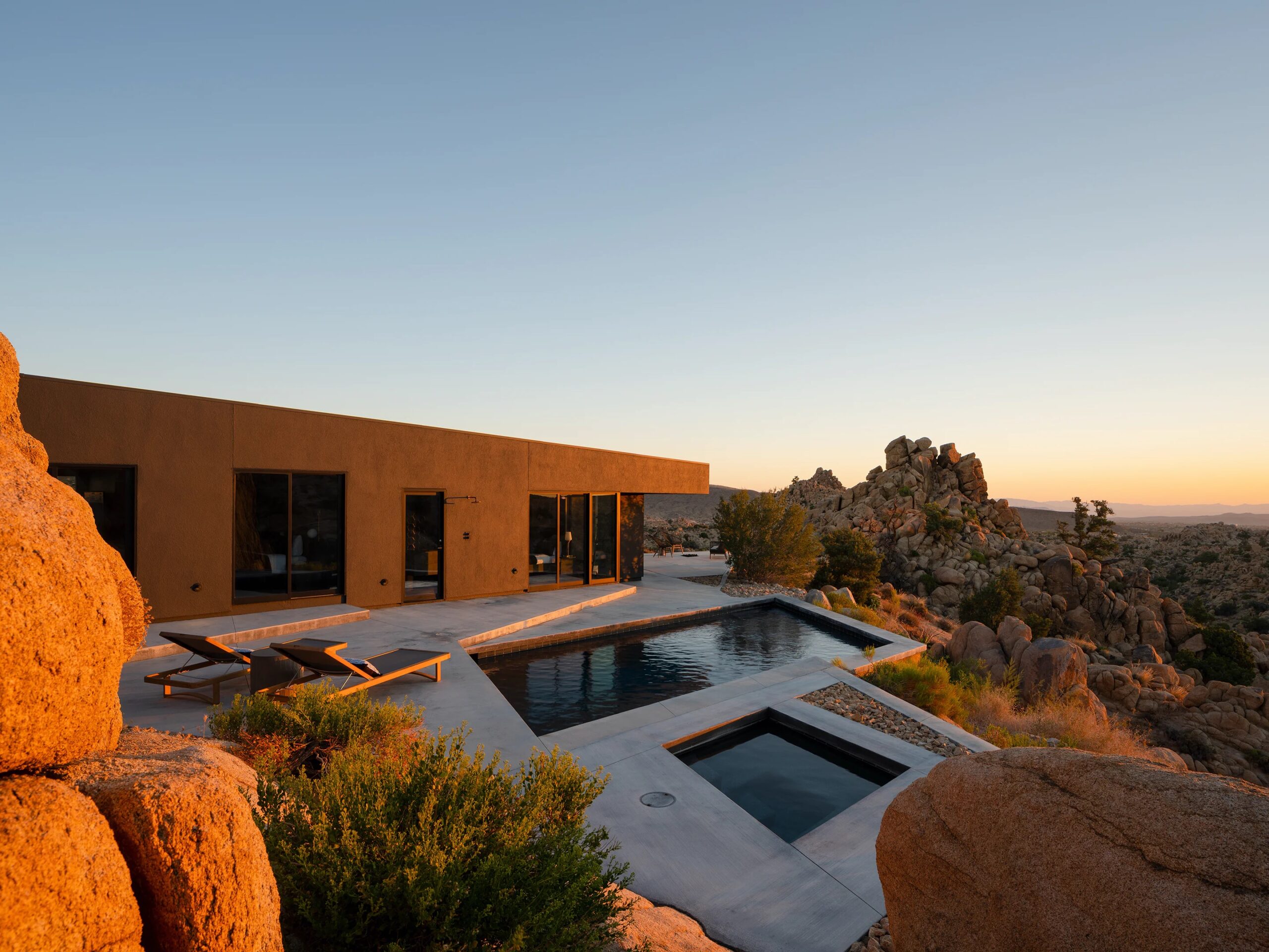 Pool and exterior of a vacation rental home near Joshua Tree National Park, California.