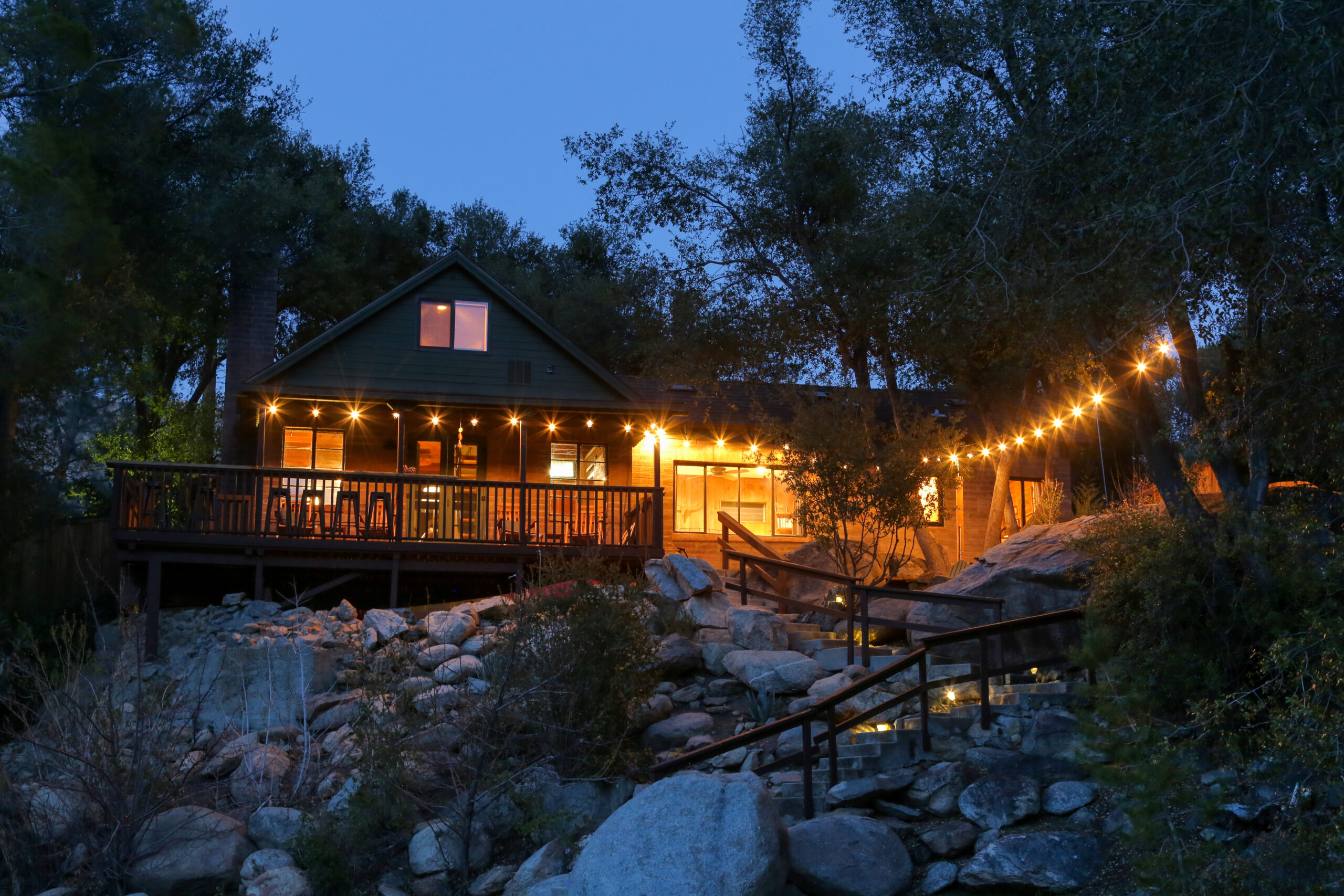 Night view of patio lights at the Kern River House's River Willow Cabin in Kernville, Califonia.