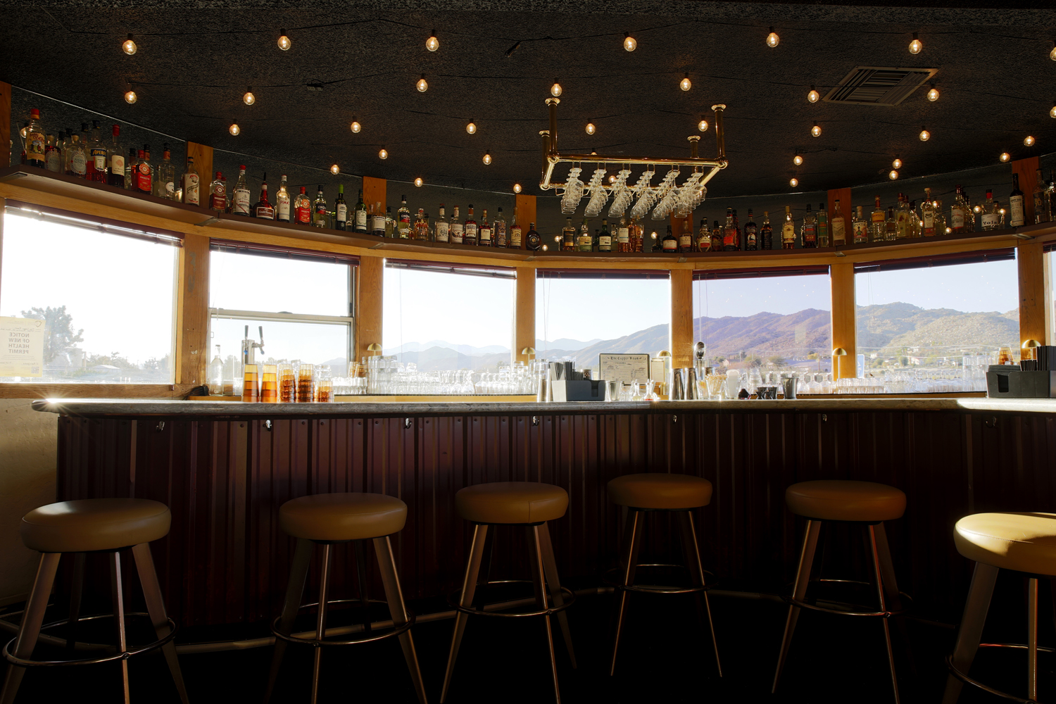 Interior view of the bar at The Copper Room restaurant and bar located at the airport in Yucca Valley, California.