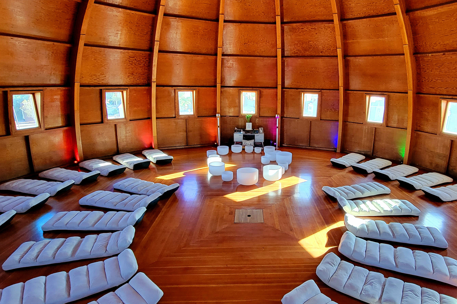Interior view of the Integratron set up with mats and crystal bowls for a sound bath in Landers near Joshua Tree, California.