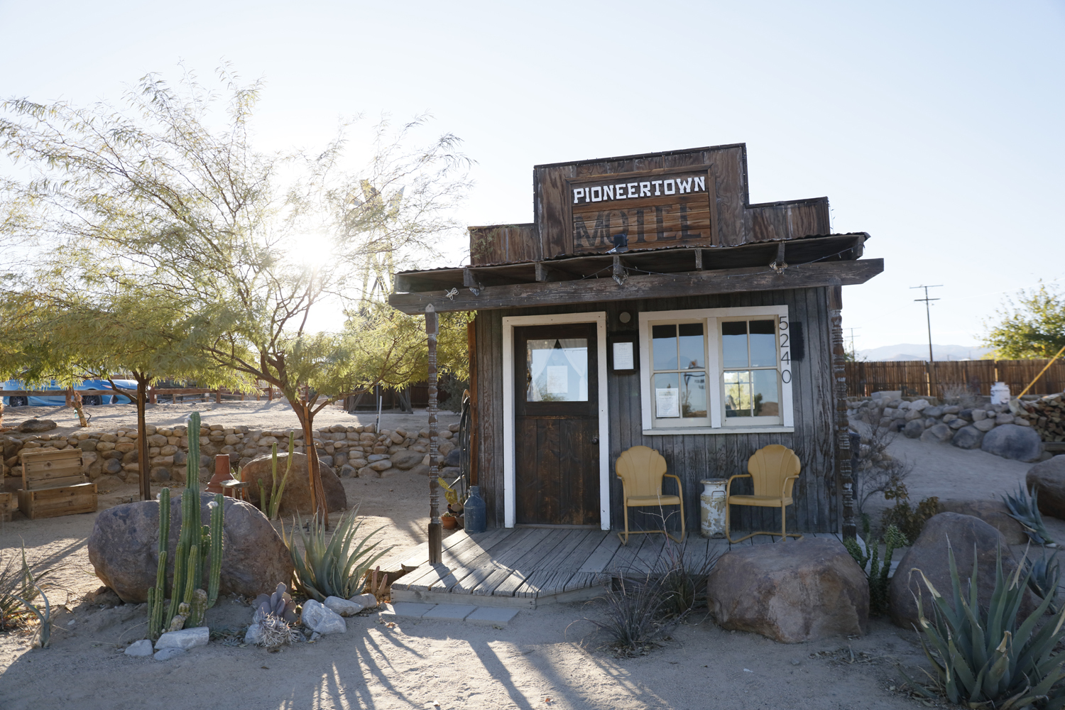 View of the small Western style building where guests check in to the Pioneertown Motel in Pioneertown, California.