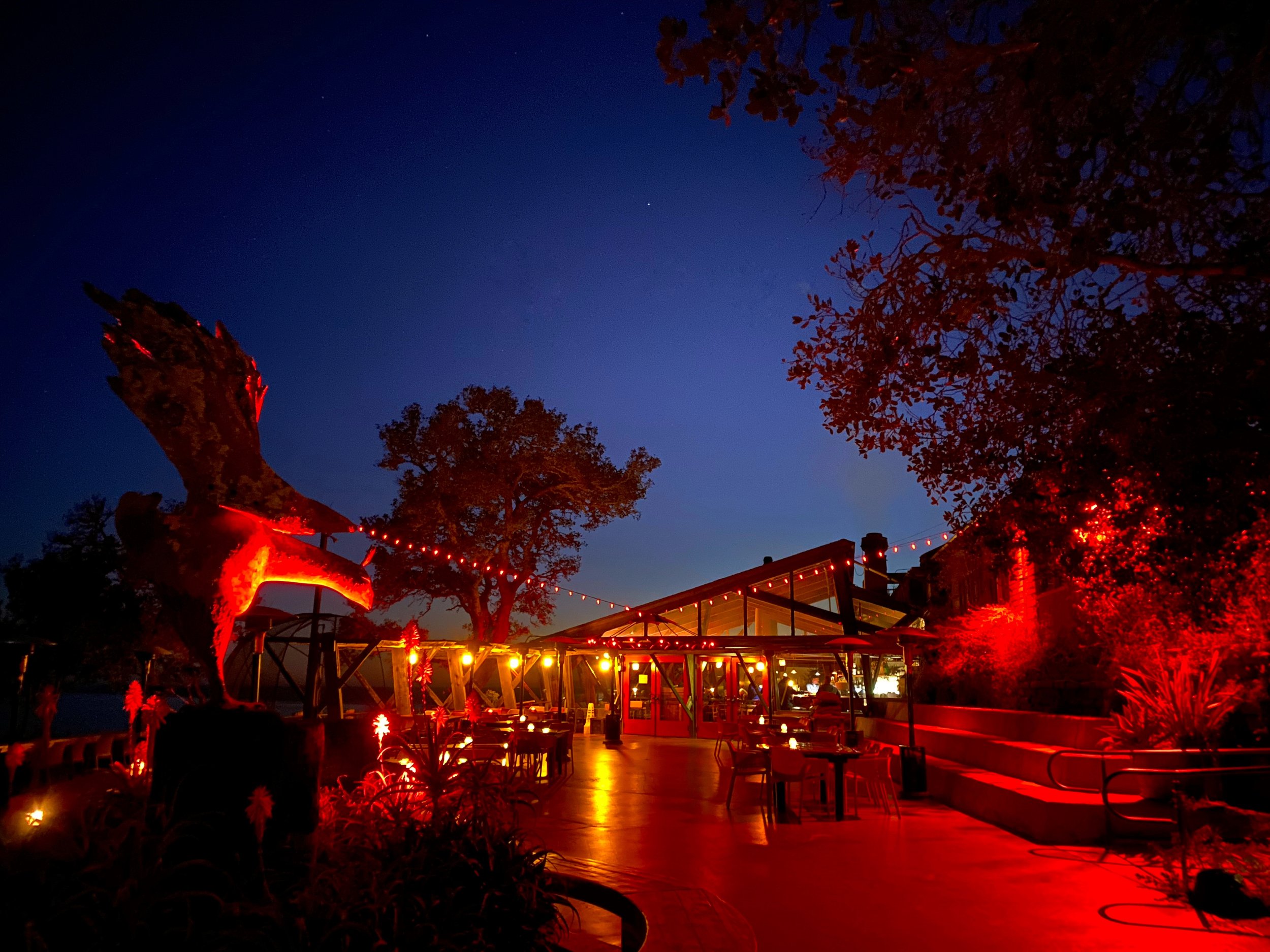 Night view of the patio at Nepenthe restaurant in Big Sur, California