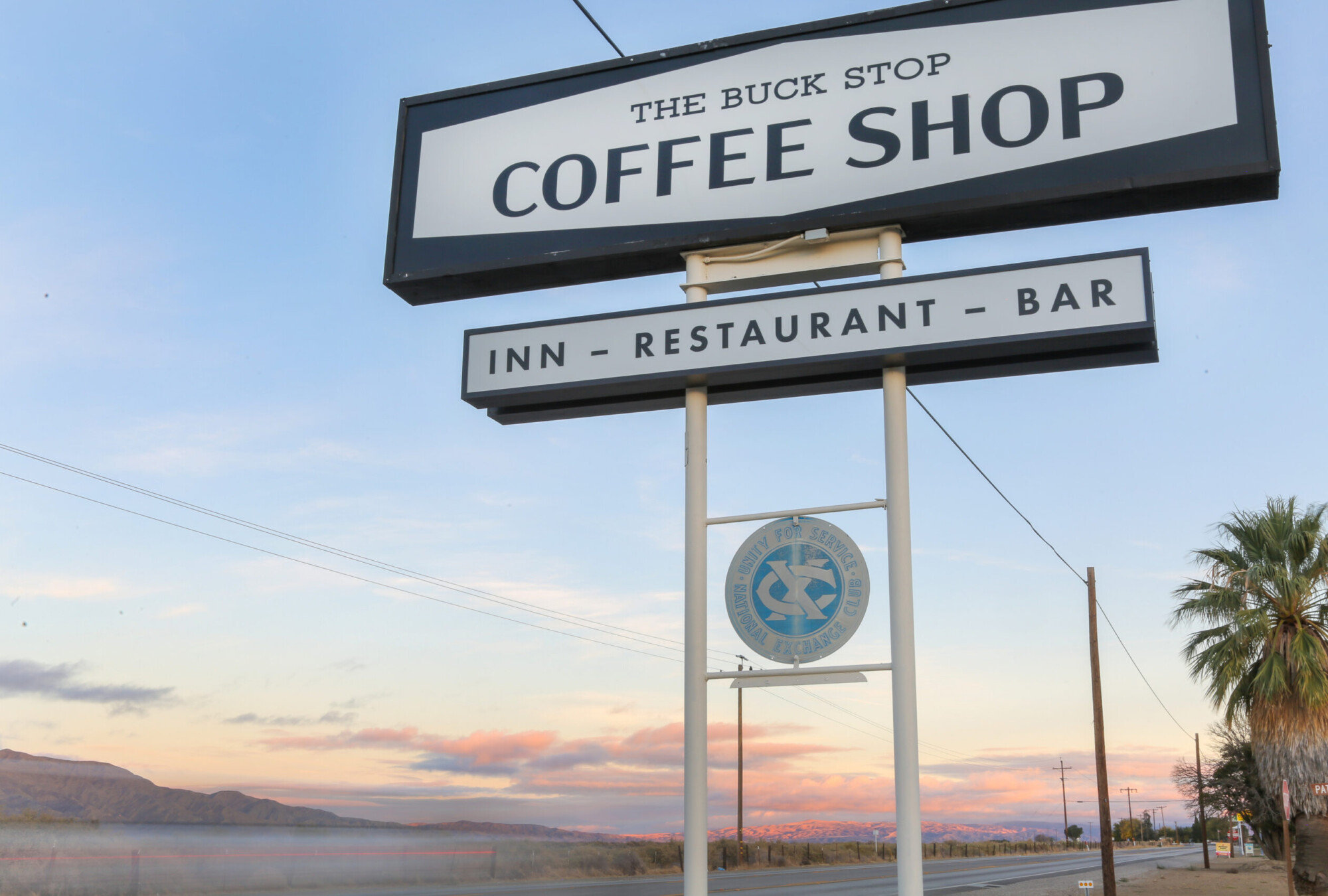 Sunset view of the Coffee Shop called The Buck Stop at the Cuyama Buckhorn in New Cuyama, California.