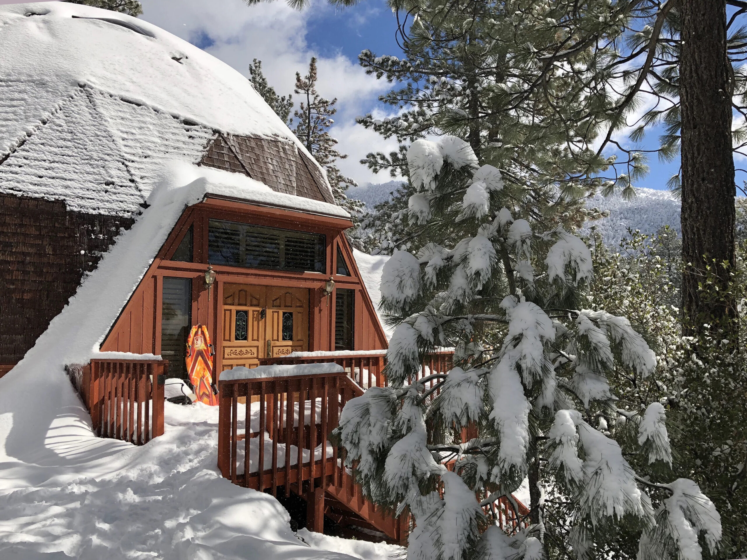 Snowy scene on a geodesic cabin rental called Under the Dome near Idyllwild, California.