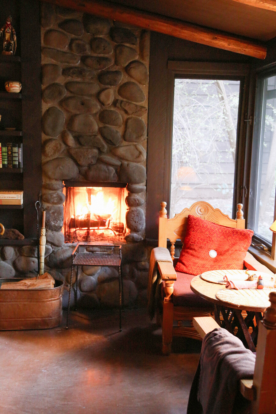 Cozy fireplace in the breakfast lobby at the Briar Patch Inn in Sedona, Arizona.