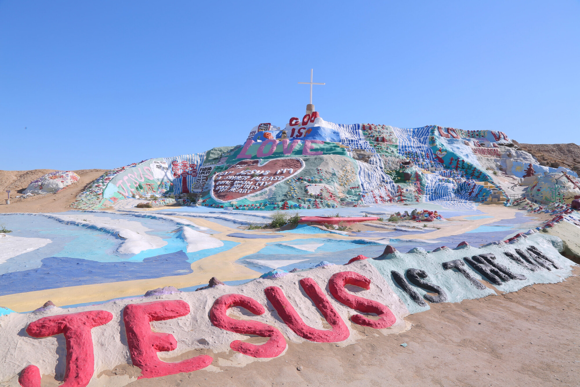 Hand painted and assembled Salvation Mountain outsider art in Southern California.