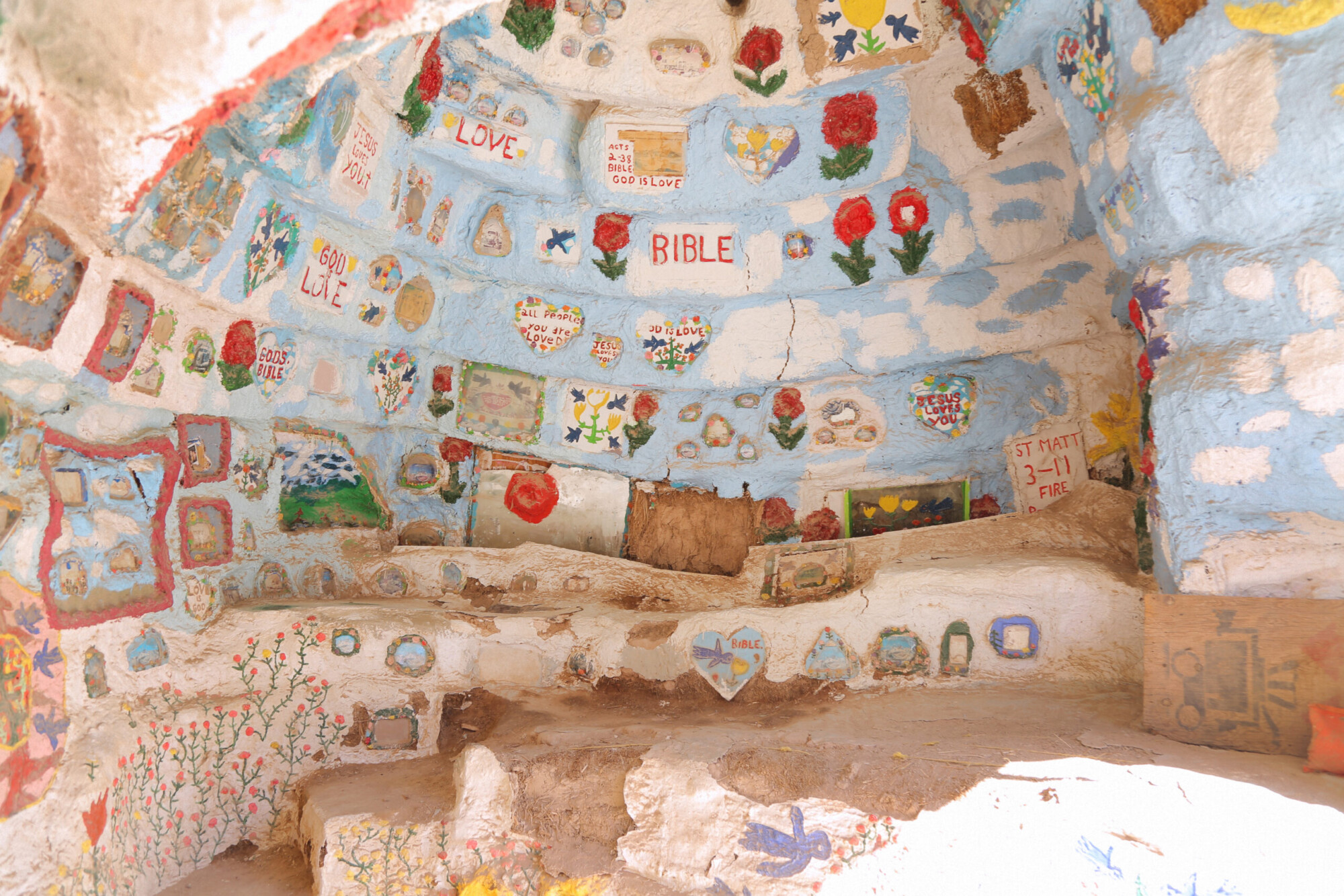Interior of a hand painted and constructed cave at Salvation Mountain, California.