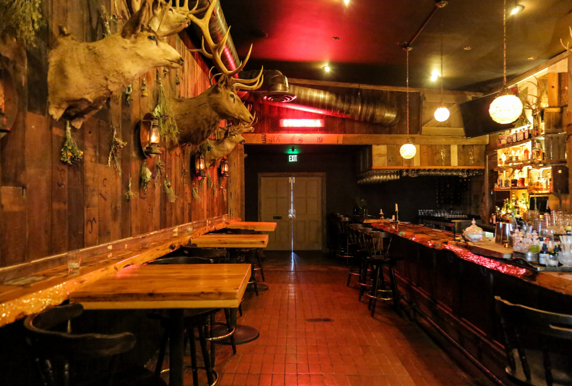 Dimly lit interior of the Cuyama Buckhorn Bar in New Cuyama, California.