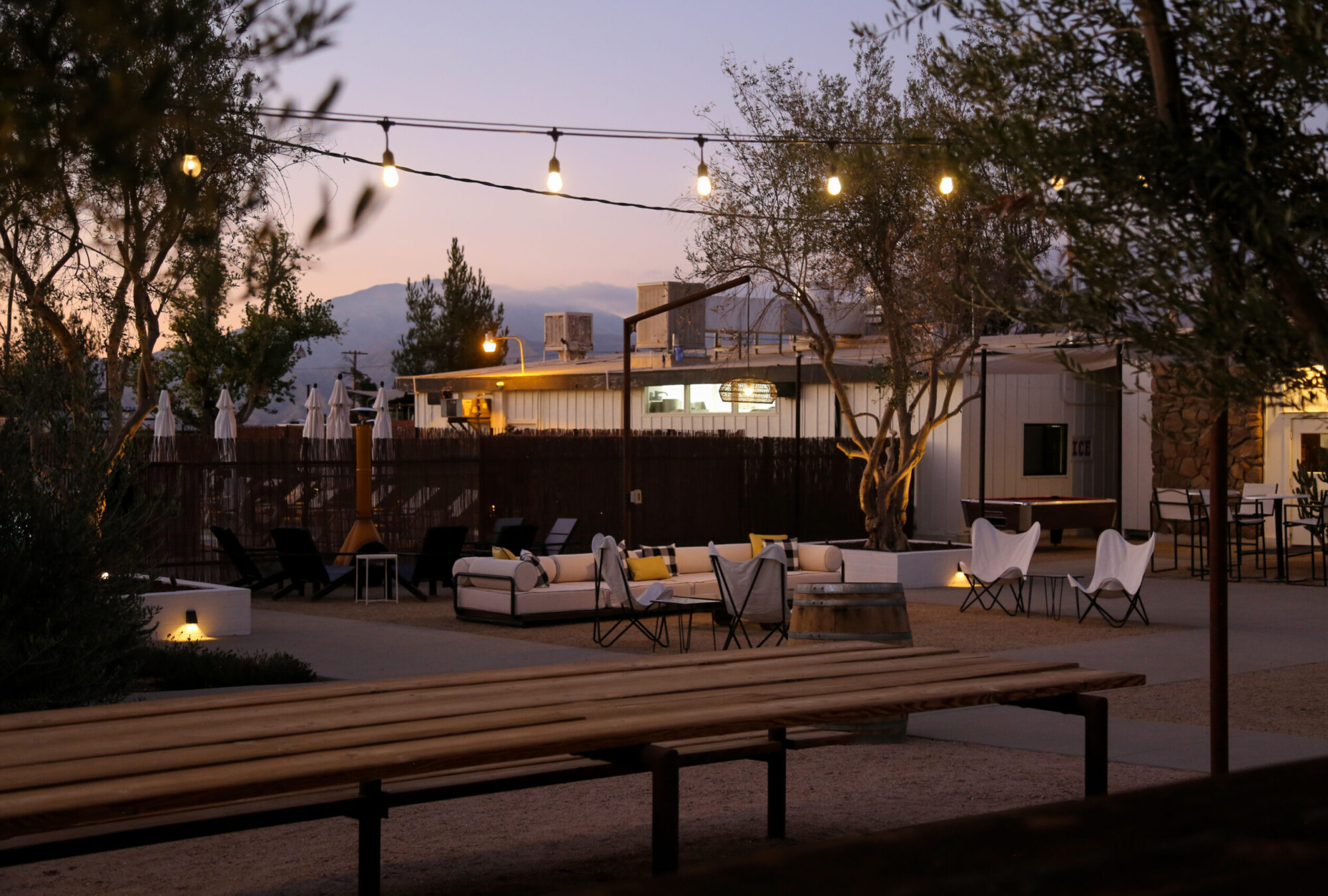 Courtyard view at dusk of the Cuyama Buckhorn lodging in New Cuyama, California.