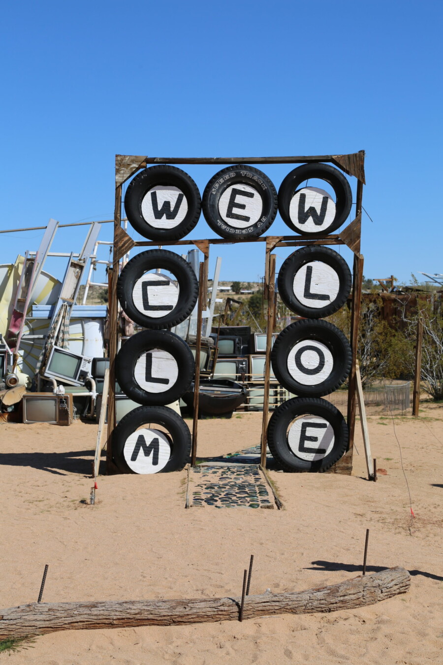 A welcome sculpture made out of repurposed tires at the Noah Purifoy Outdoor Sculpture Assemblage museum in Joshua Tree, California.